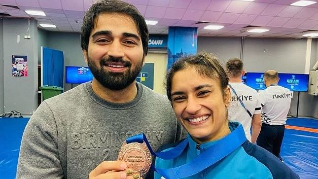 <div class="paragraphs"><p>Champion wrestler Vinesh Phogat with her husband Somvir Phogat.</p></div>